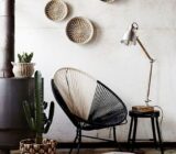 African gourmet giraffe table on a white sofa